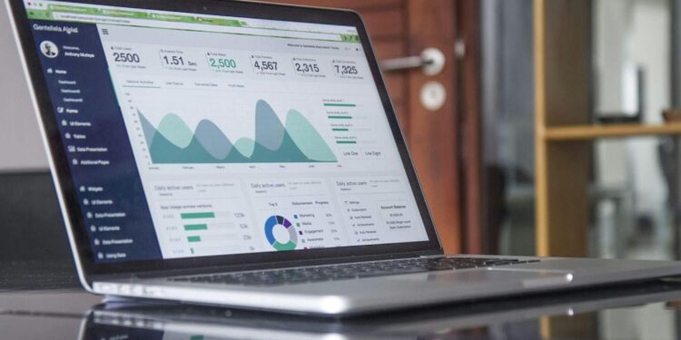 A monitor showing real-time data dashboards, representing the continuous monitoring at the heart of AI managed security.